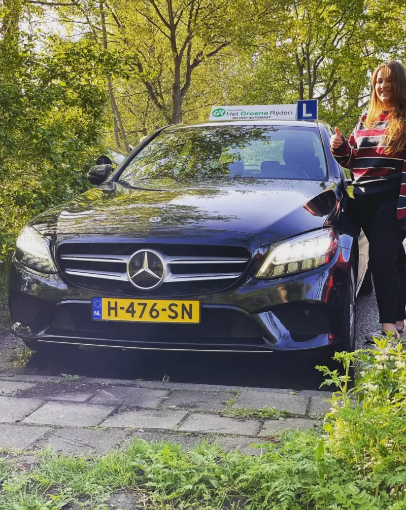 International expat passing the Dutch CBR practical exam with Driving School Leiden